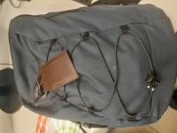 CS1858/2025  BLU BACKPACK WITH BROWN NAME TAG ON